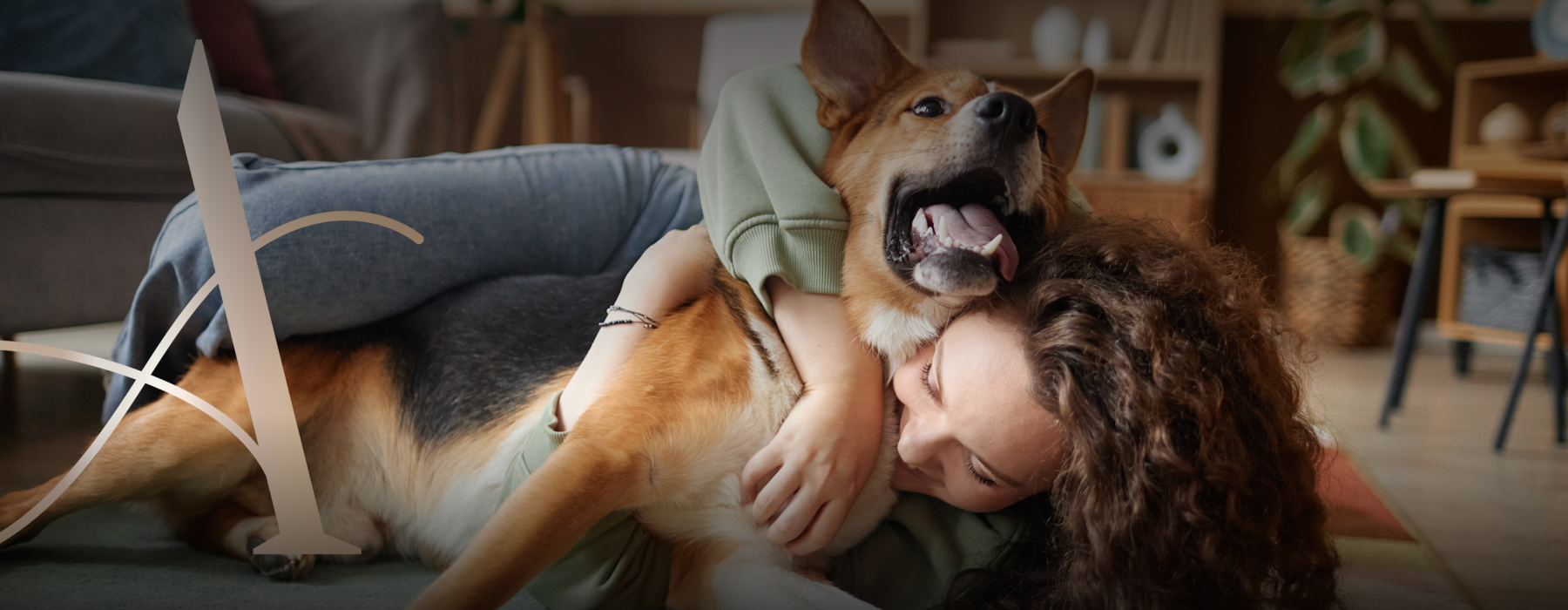 woman playing with a dog