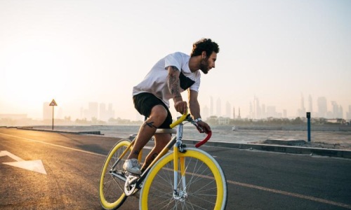 Find your perfect fit at Ancora a man riding a bicycle on a road