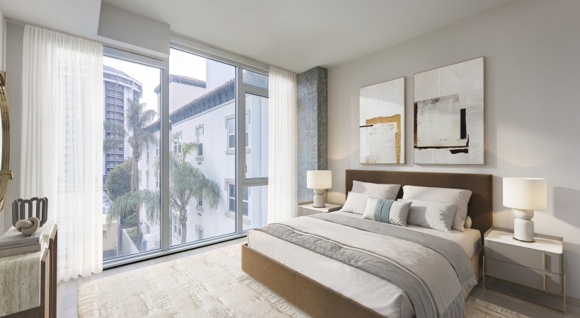 Spacious bedroom image with large windows