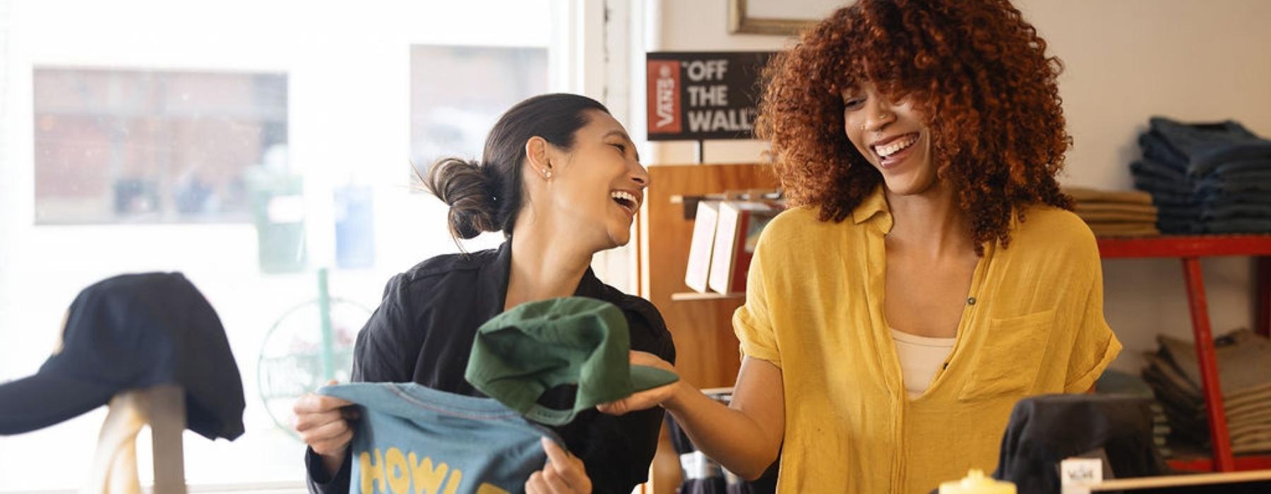 a person and a person looking at a shoe store
